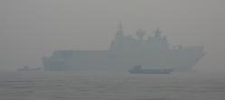 HMAS Adelaide in smoke in Twofold Bay